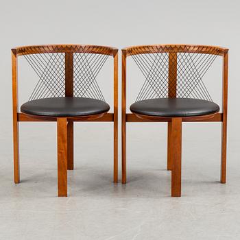 a pair of mahogany armchairs designed by Niels Jörgen Haugesen, made by Tranekaer Furniture, Denmark. 1995.