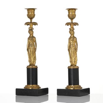 A pair of late Gustavian marble and ormolu candlesticks attributed to F. L. Rung (1758-1837).