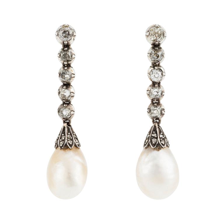 A pair of silver and gold earrings with drop-shaped pearls and old- and rose-cut diamonds.