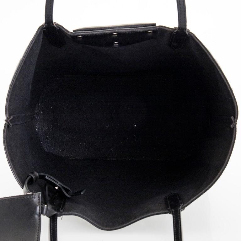Givenchy, a 'Star Perforated Antigona Shopper' bag.