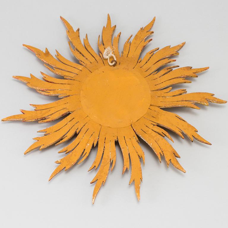 A mirror in shape of a sun, second half of the 20th century.