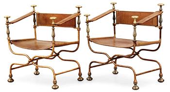389. A pair of Italian neo-classical iron and brass
easy chairs, Italy mid 20th C.