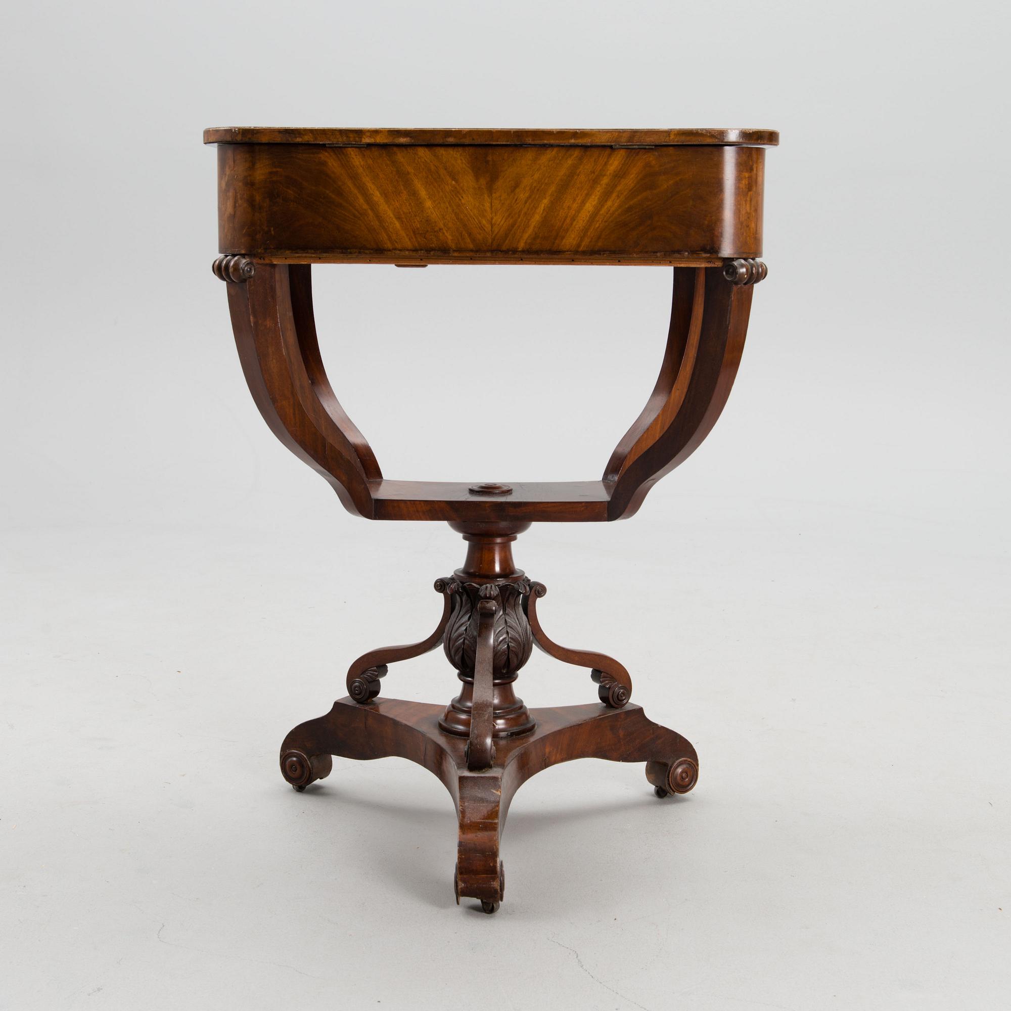A sewing table from the first half of the 19th century.