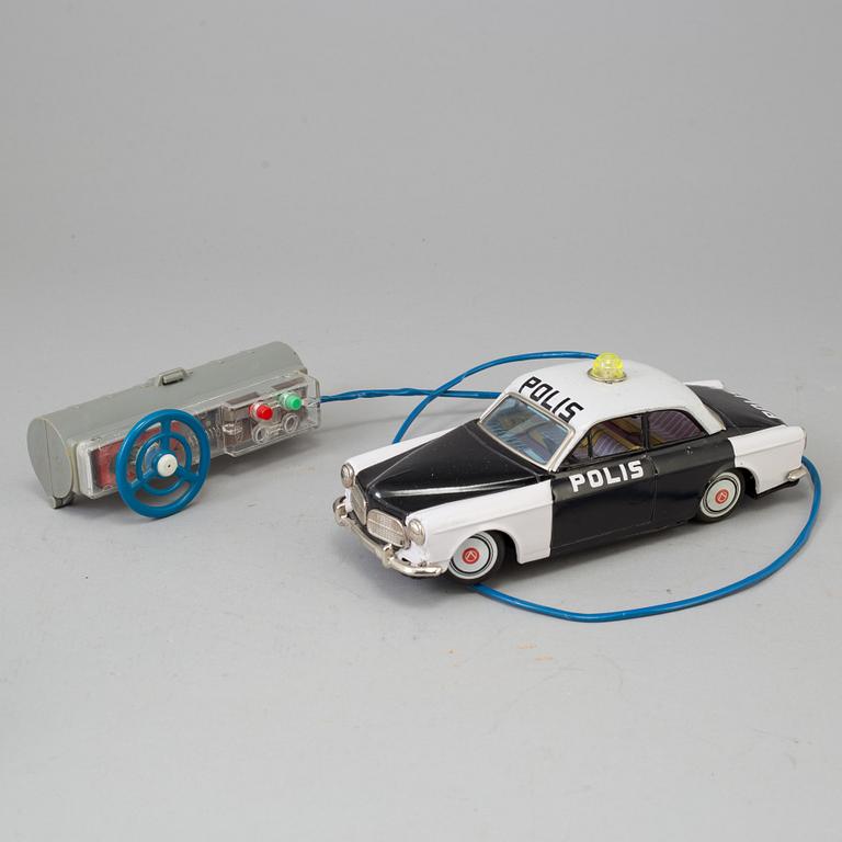 4 toy cars including Bandai and Nomura toys, Japan 1950's-60's.