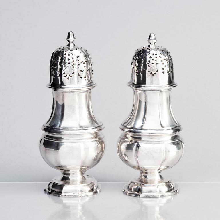 A pair of Swedish silver sugar shakers, mark of Conrad Gadd, Kristianstad 1744 and Johan Bergengren, Kristianstad 1754.