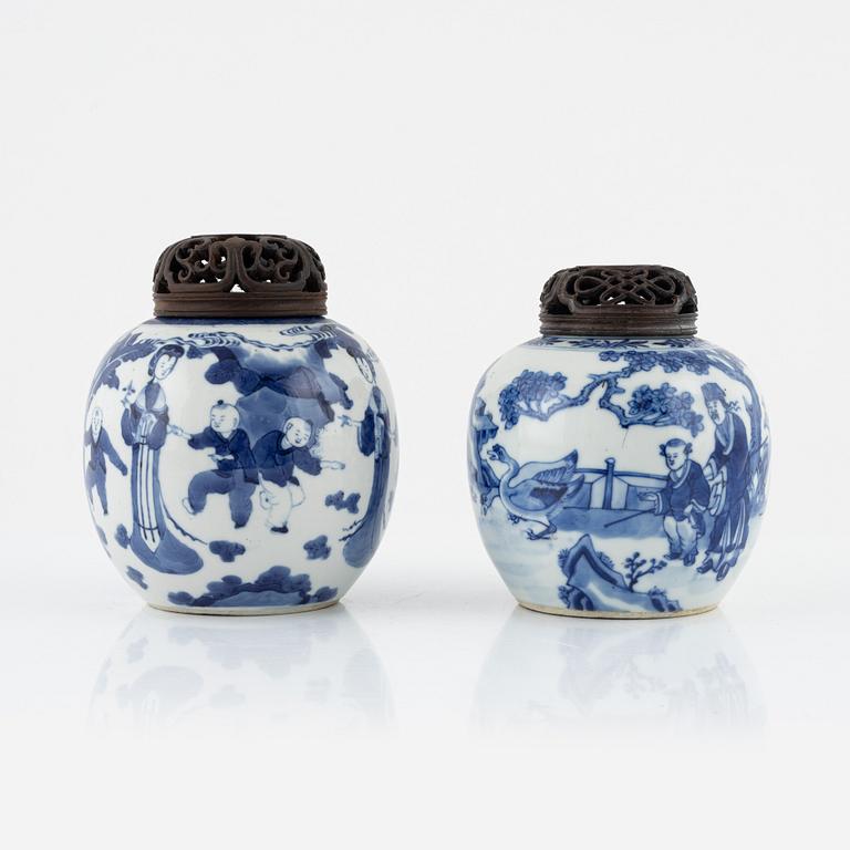 Two similar blue and white lidded urns, China, 19th century.