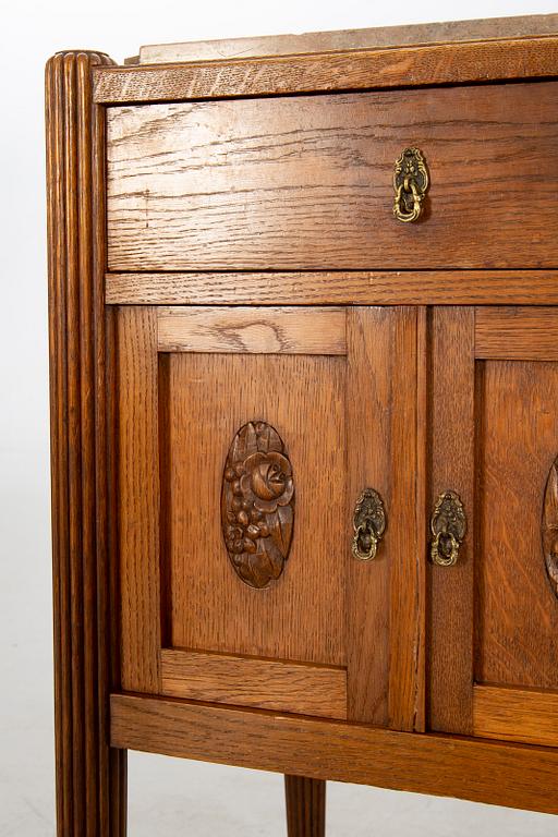 A pair of oak bedside tables beginning of the 20th century.