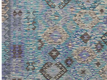 A kilim carpet, c 341 x 257 cm.