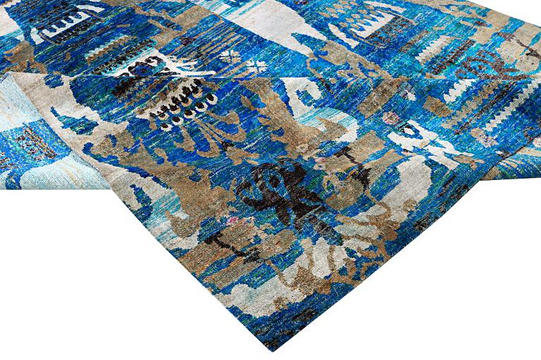 An oriental carpet, c. 356 x 261 cm.