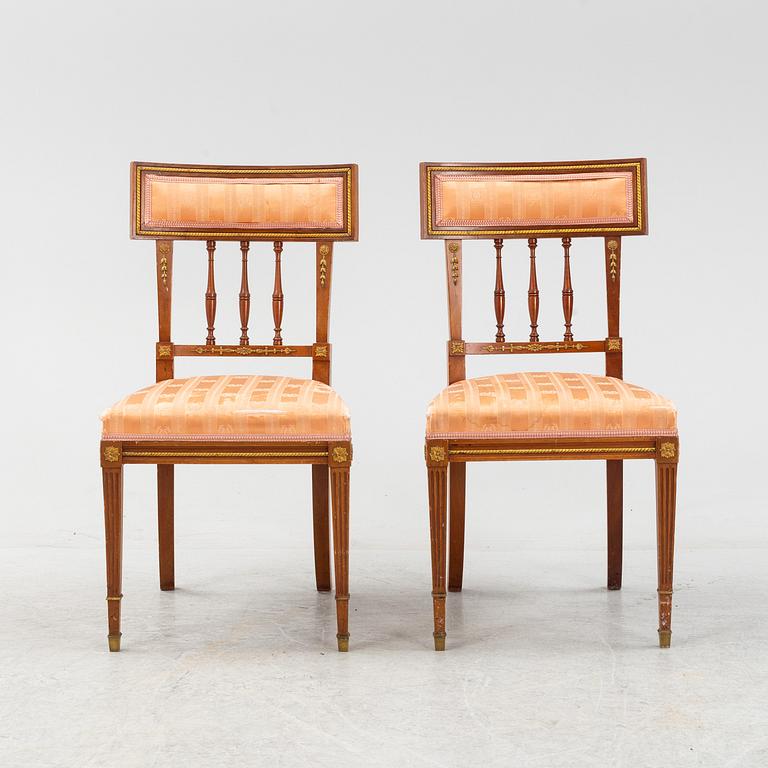 An Empire style table, a sofa and eight chairs, early 20th Century.