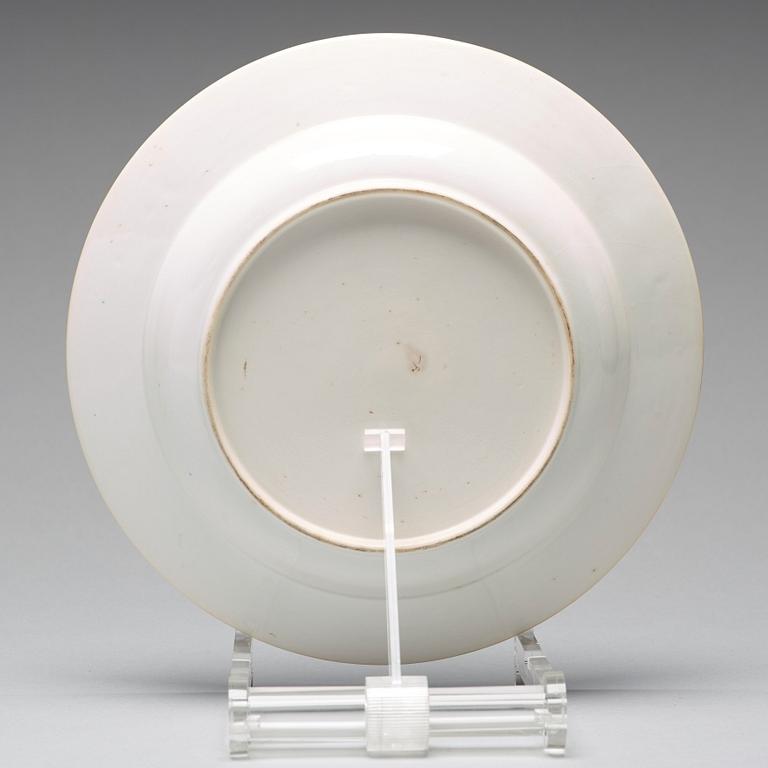 A set of eight blue and white armorial soup dishes, Qing dynasty, 18th Century.