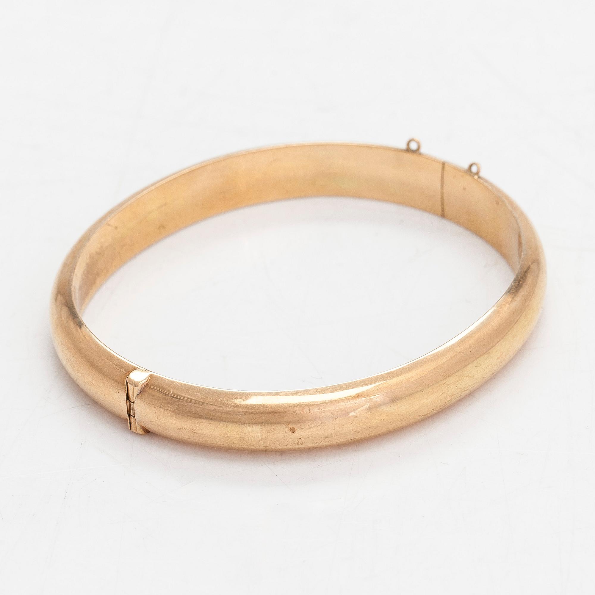 Armring, 14K guld, Aimo Koskinen, Helsingfors 1967.