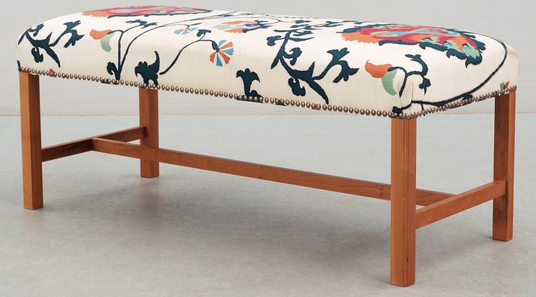 A Josef Frank cherry wood bench, Svenskt Tenn, model 2082.