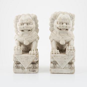 A pair of Chinese sculpture of buddhist lions, 20th Century.