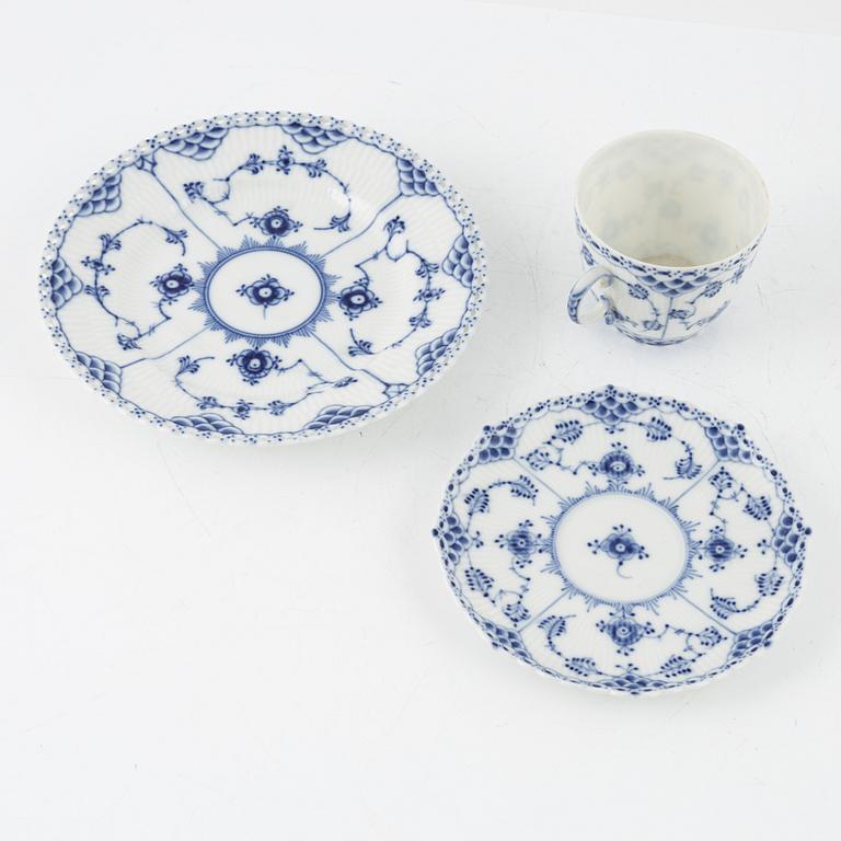 Royal Copenhagen, a 25-piece porcelain coffee service 'Musselmalet Full and Half Lace', Denmark.