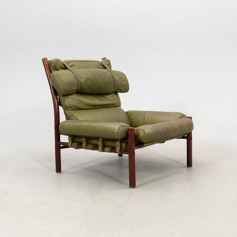 Arne Norell, a pair of armchairs and a footstool "Inca", Norell Möbel AB, second half of the 20th century.