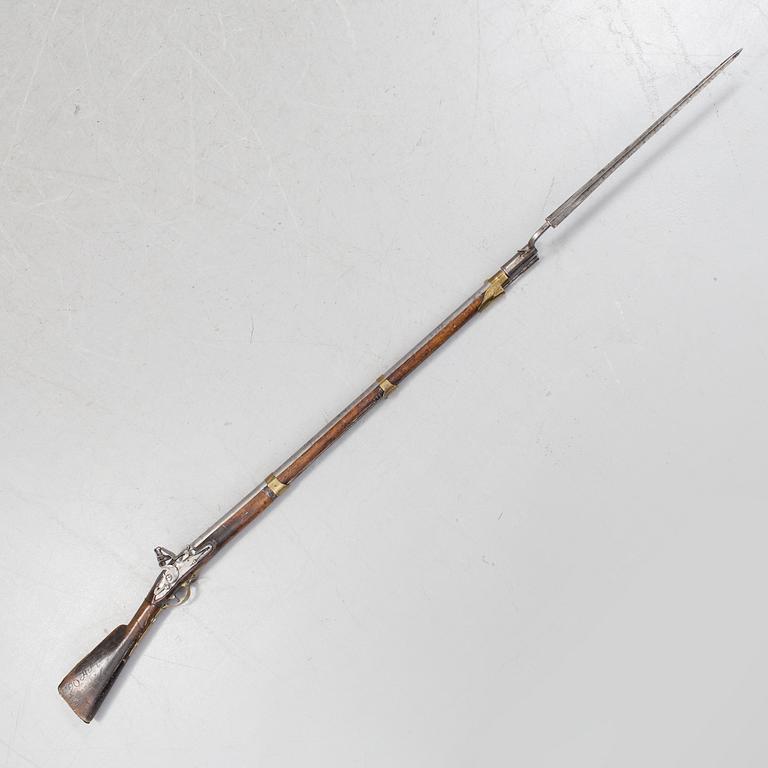 a Swedish early 19h Century flintlock rifle possibly by Huskvarna Gevärsfaktori.