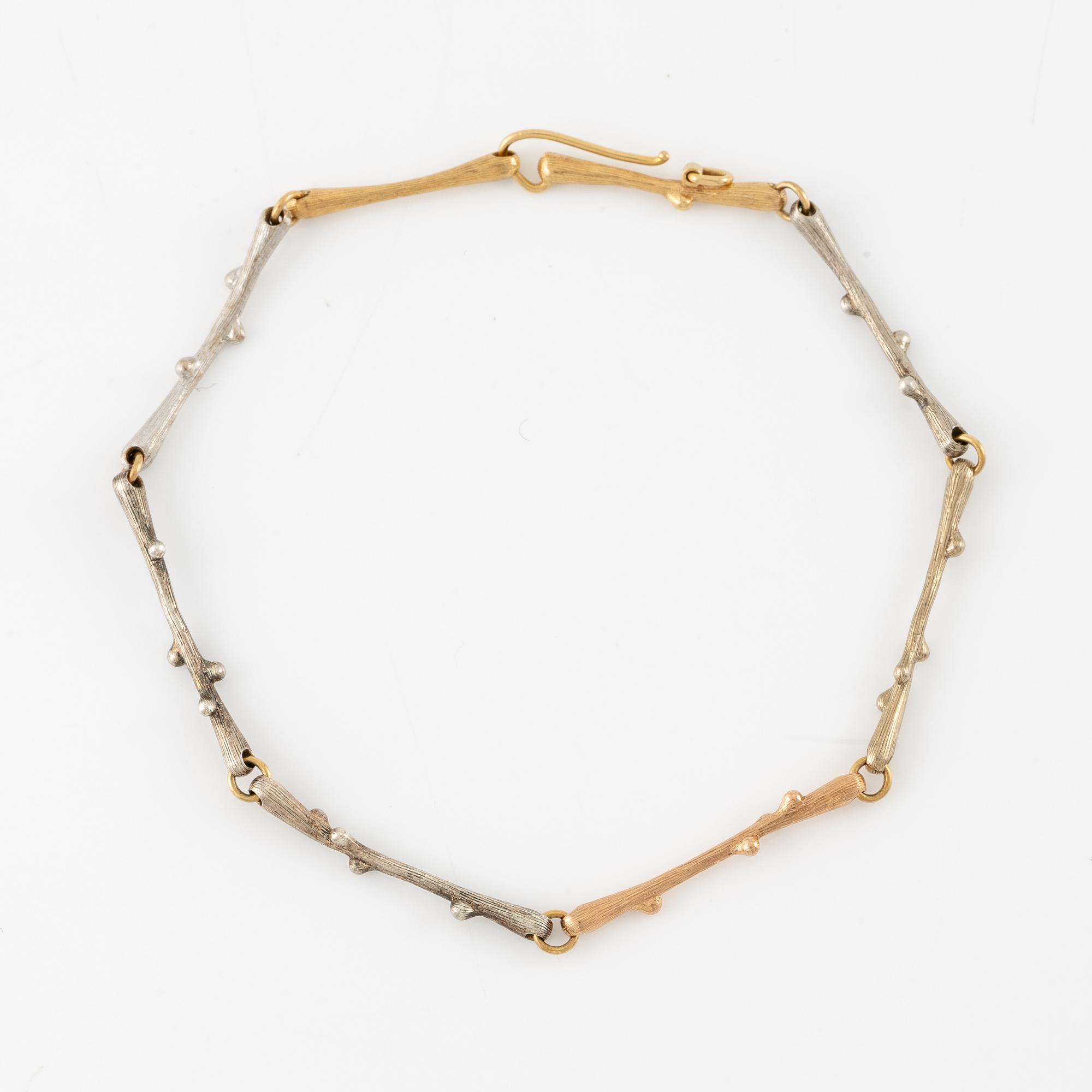 Ole Lynggaard armband 18K guld i tre färger, design Charlotte Lynggaard.