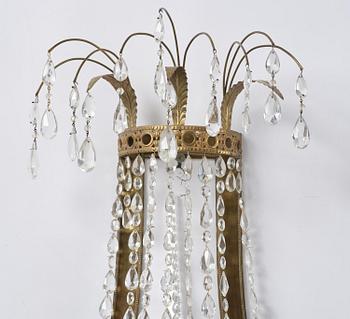 A pair of Russian Louis XVI-style  four-branch gilt bronze appliques, 19th century.
