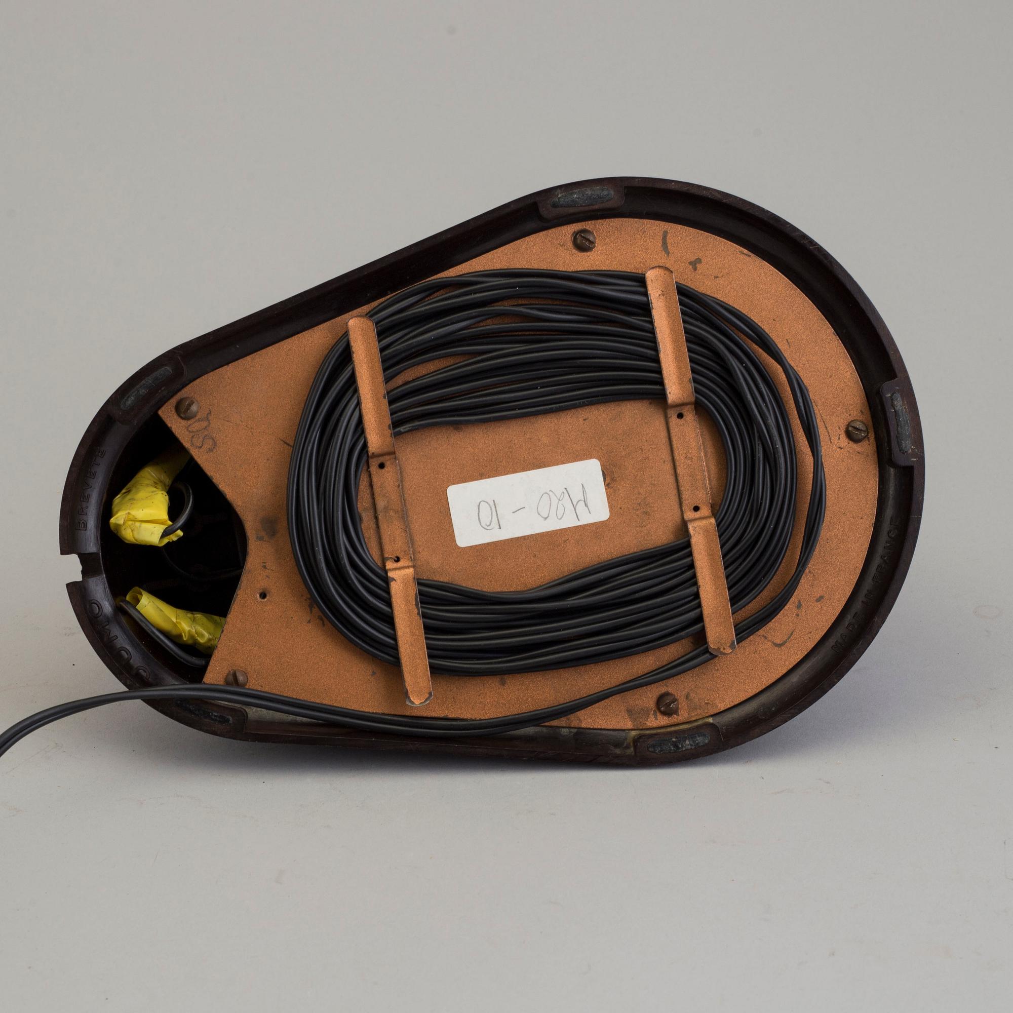 a bakelite and metal table 'Bolide' table lamp, by JUMO, 1940's.