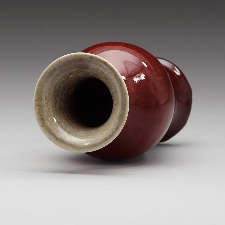 A sang de boef glazed vase, Qing dynasty, 19th Century.