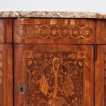 A pair of Louis XVI corner cupboards by Francois Gaspard Teunè (master in Paris from 1766), 18th century.