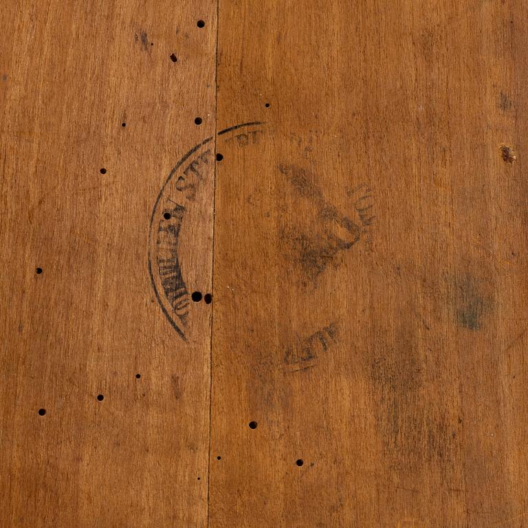 A mahogany veneered table, circa 1800.