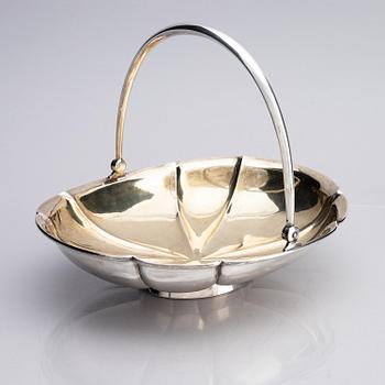 A Russian parcel-gilt silver bread basket, mark of Morosov, St. Petersburg, Russia, turn of the 20th century.