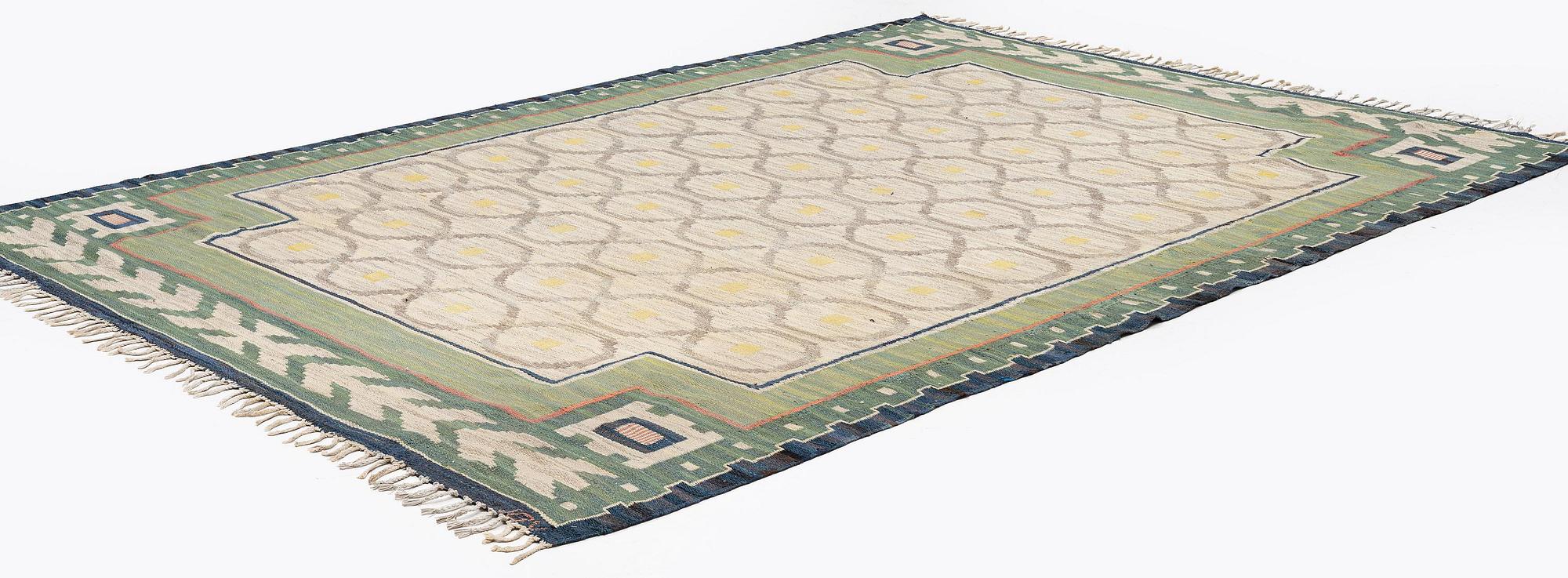 A carpet, flat weave, c. 340 x 246 cm, signed JBV (Johanna Brunssons Vävskola).