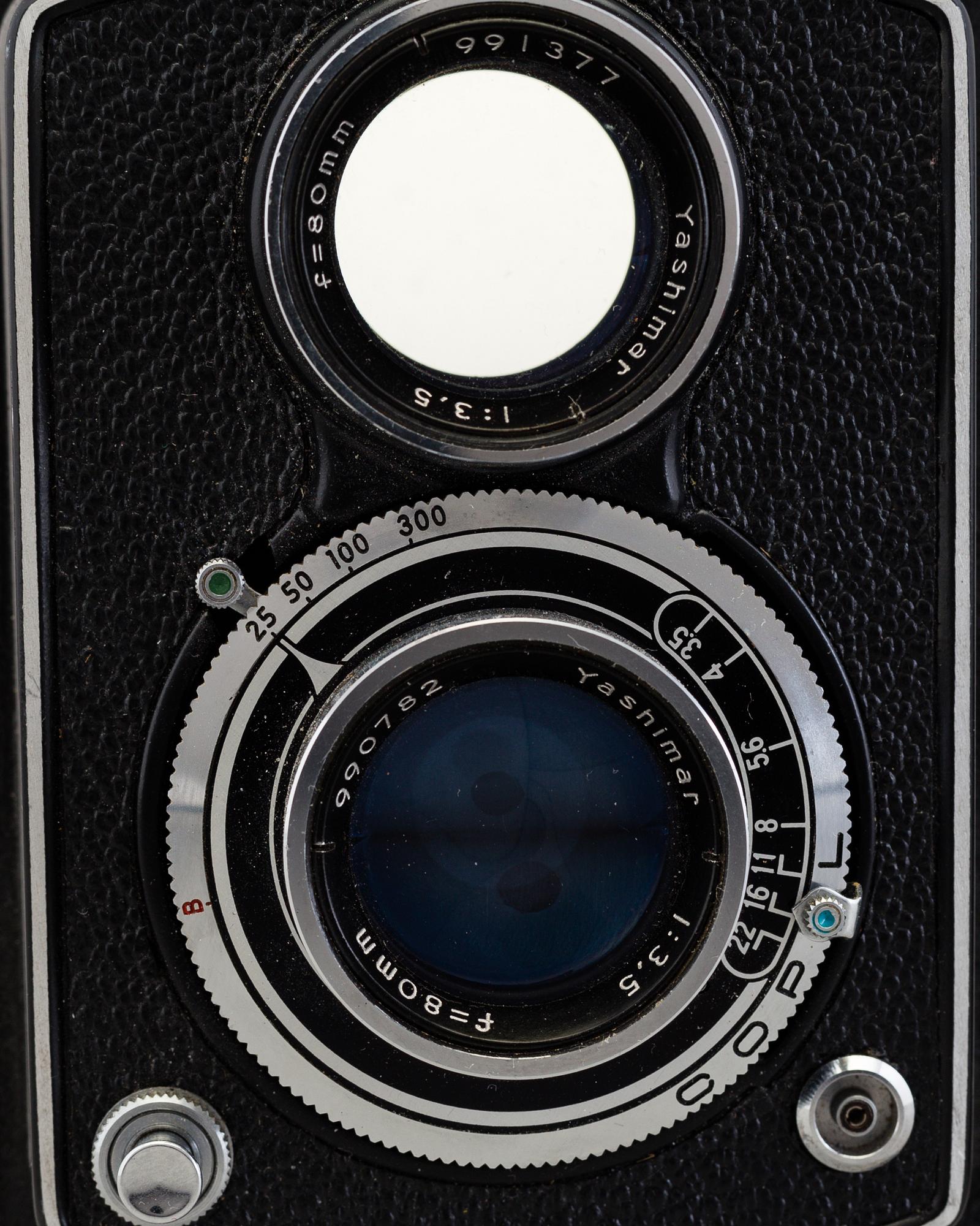 A Yashica-A and a Robot Star camera, mid 20th century.