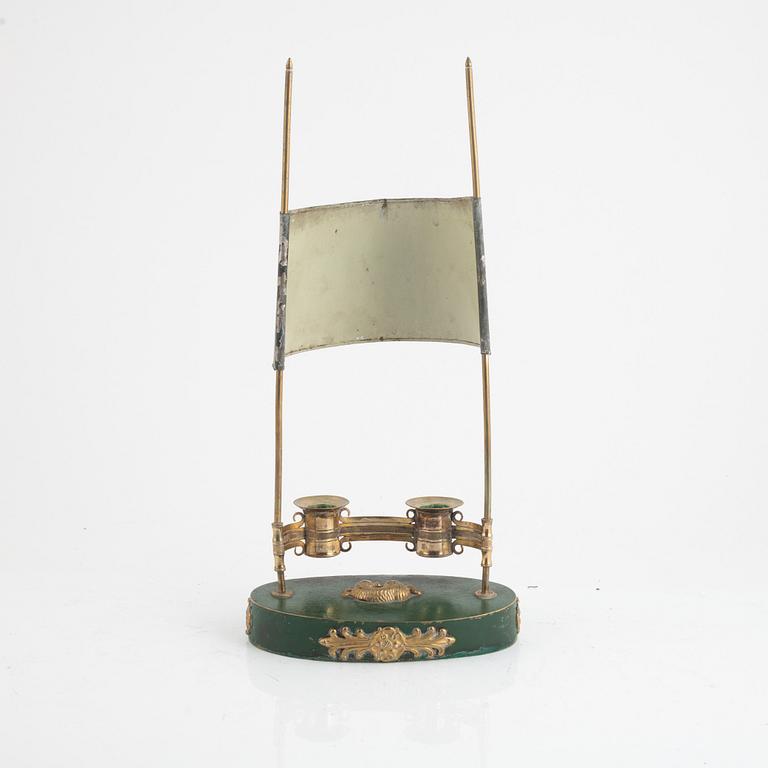 A swedish Empire two-light gilt-brass and tôle-peinte reading lamp, early 19th century.