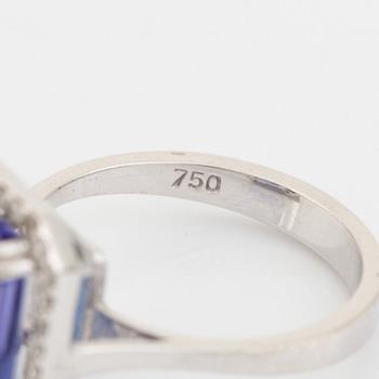 Emerald cut tanzanite and brilliant cut diamond cocktail ring.