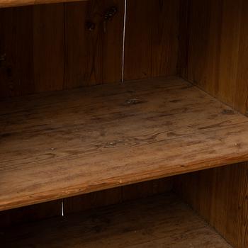 An 18th two-part pine century cabinet.
