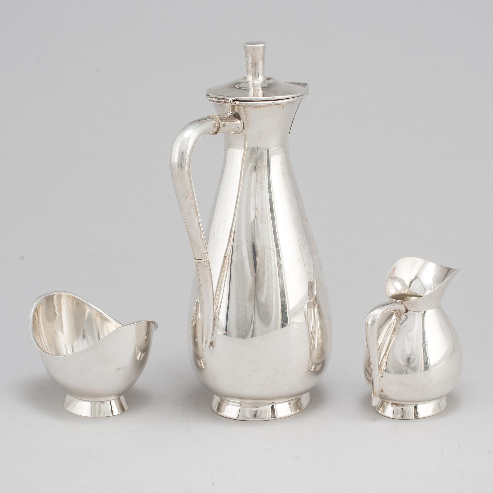 A three piece sterling silver coffee set, Germany. 20th century.