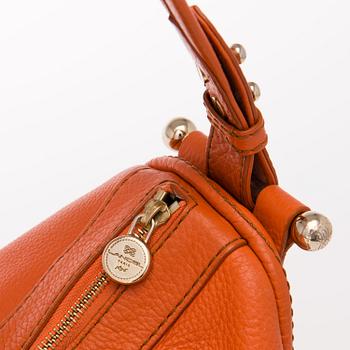 A LANCEL ORANGE LEATHER HOBO BAG.