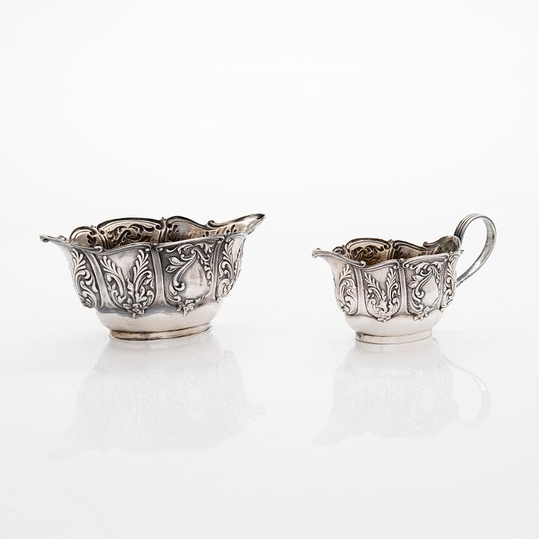 A set of four salt cellars with spoons, and a cream jug and sugar bowl, London, England 1902-1903.