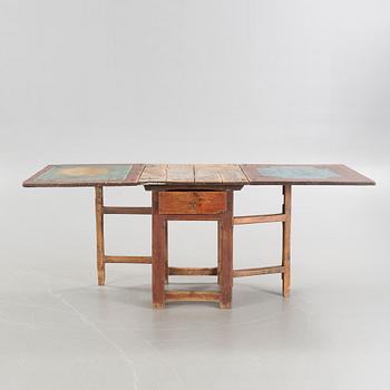 A mid 19th century gateleg table.