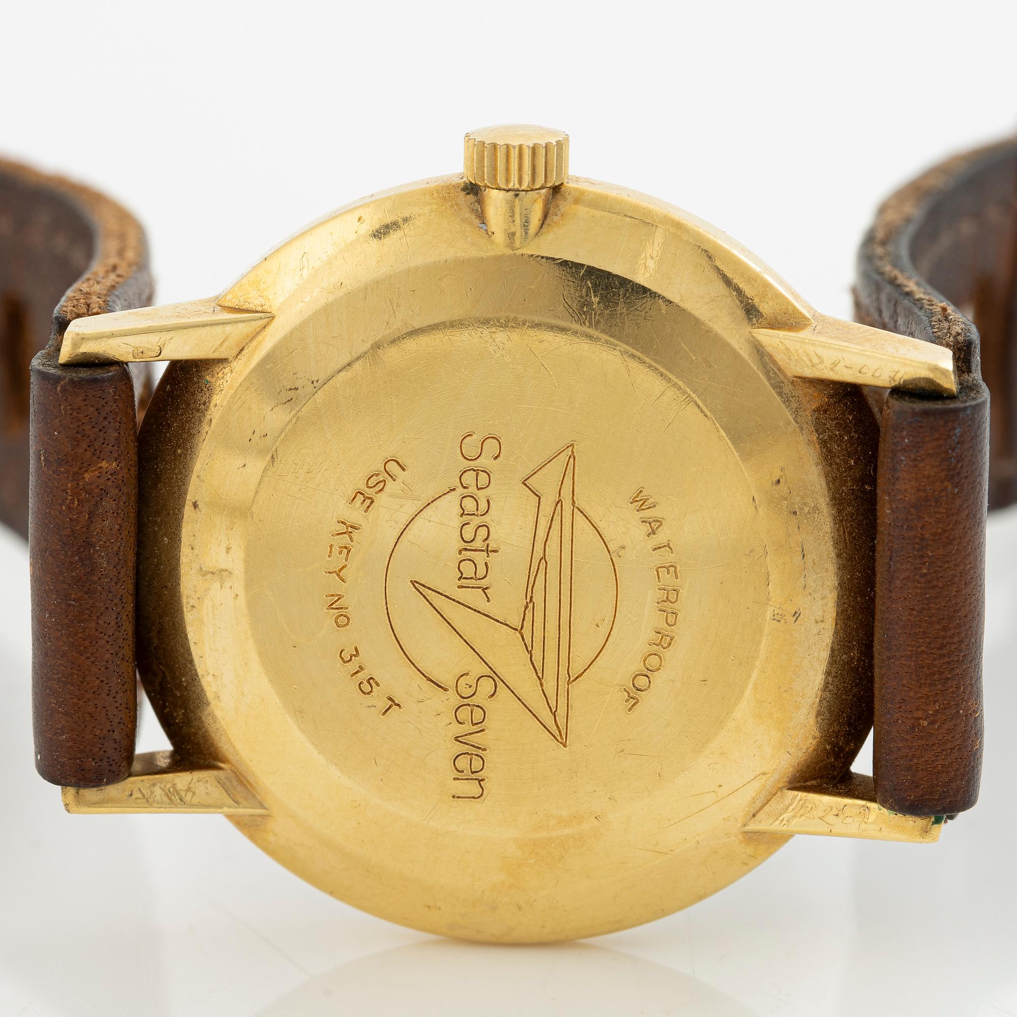 Tissot, Seastar Seven, 18K gold, wristwatch, 34 mm.