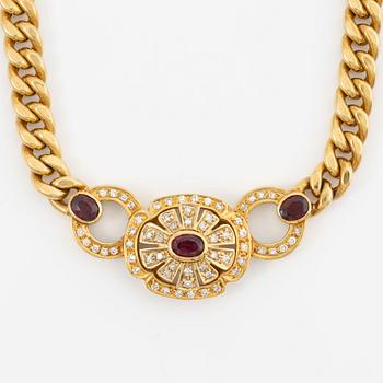 Necklace in 14K gold with faceted rubies and eight-cut diamonds.