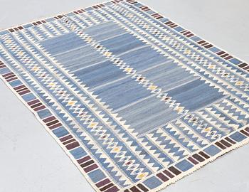 Barbro Nilsson, a carpet, "Salerno blå", flat weave, ca 245 x 177 cm, signed AB MMF BN.