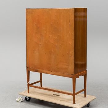 A mid 20th Century bar cabinet.