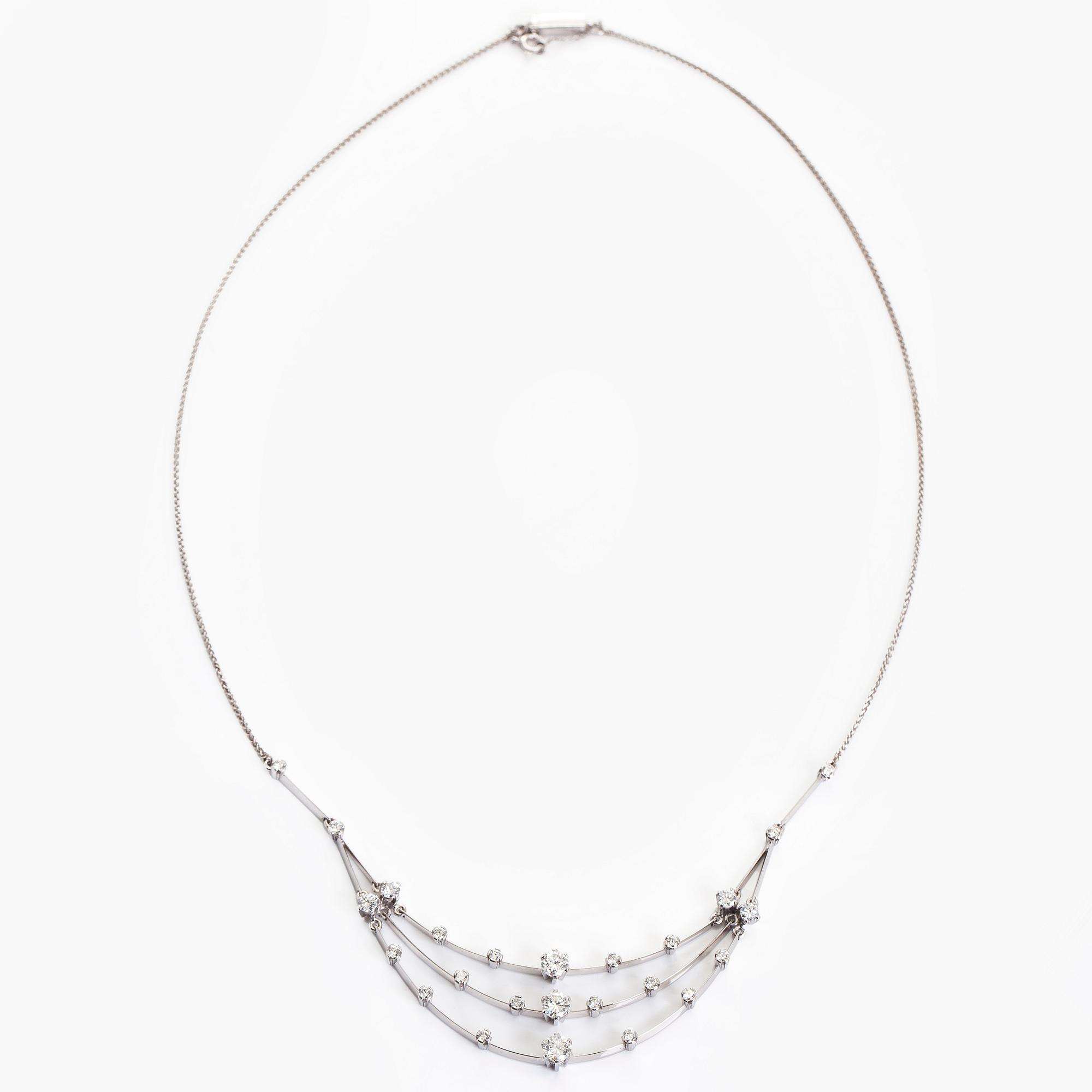 Collier, 18K vitguld med briljantslipade diamanter. A Tillander 1973.