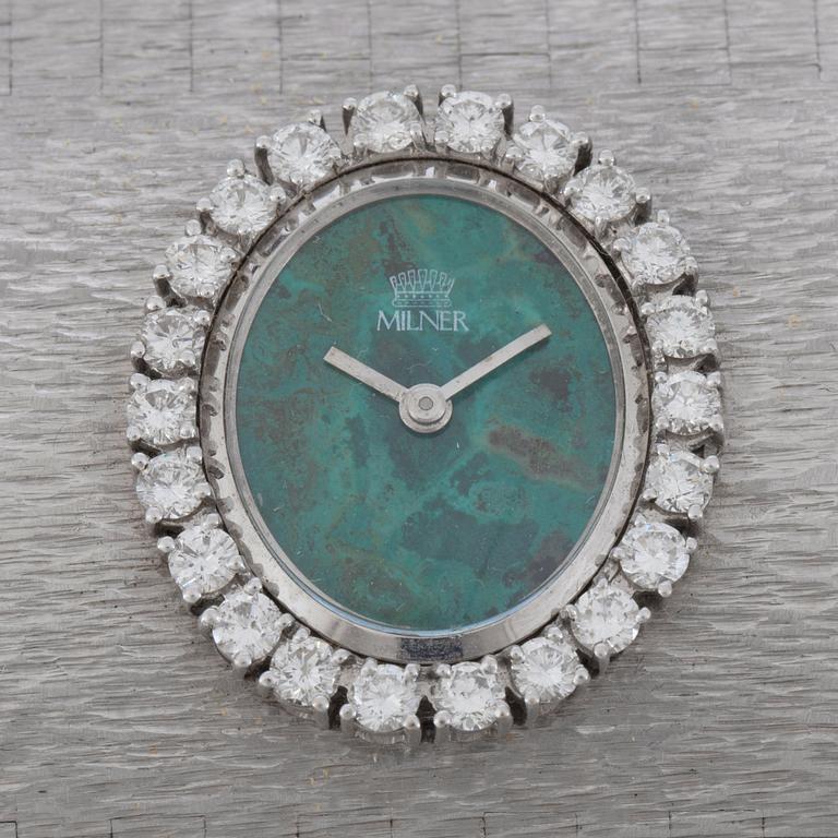 A Milner ladie's wristwatch. Dial in chrysocolla and bezel set with brilliant-cut diamonds.