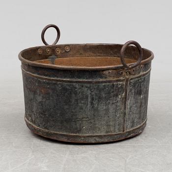 A 19th century copper cauldron.