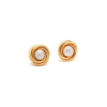 398. CHANEL, a pair of decorative pearl earclips.