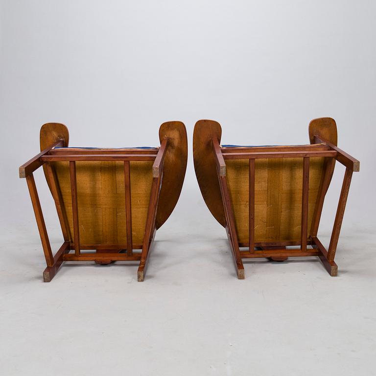 A pair of Arts and Crafts armchairs, early 20th century.