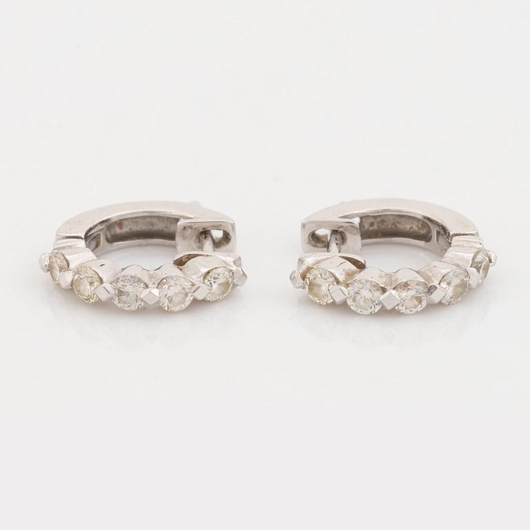 Brilliant cut diamond earrings.