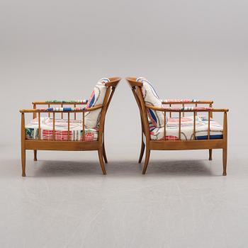 a pair of "Skrindan" armchairs, by Kerstin Hörlin-Holmquist, OPE.