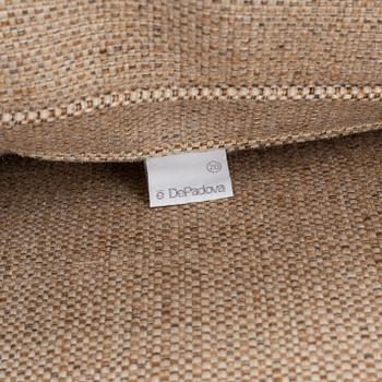 A 'Raffles' sofa designed by Vico Magistretti in 1988 for DePadova.