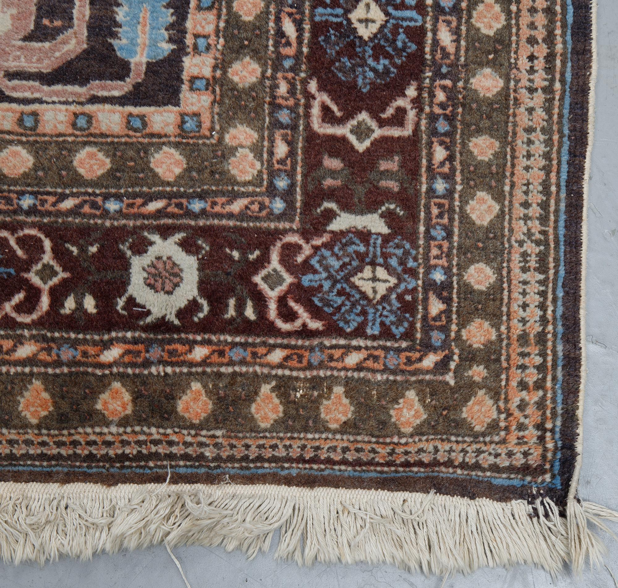 A carpet, semi-antique/Old Ardabil, ca 264 x 272 cm.